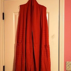 Mid Length Sweater Cardigan Vest, best of all, it has POCKETS on both sides.